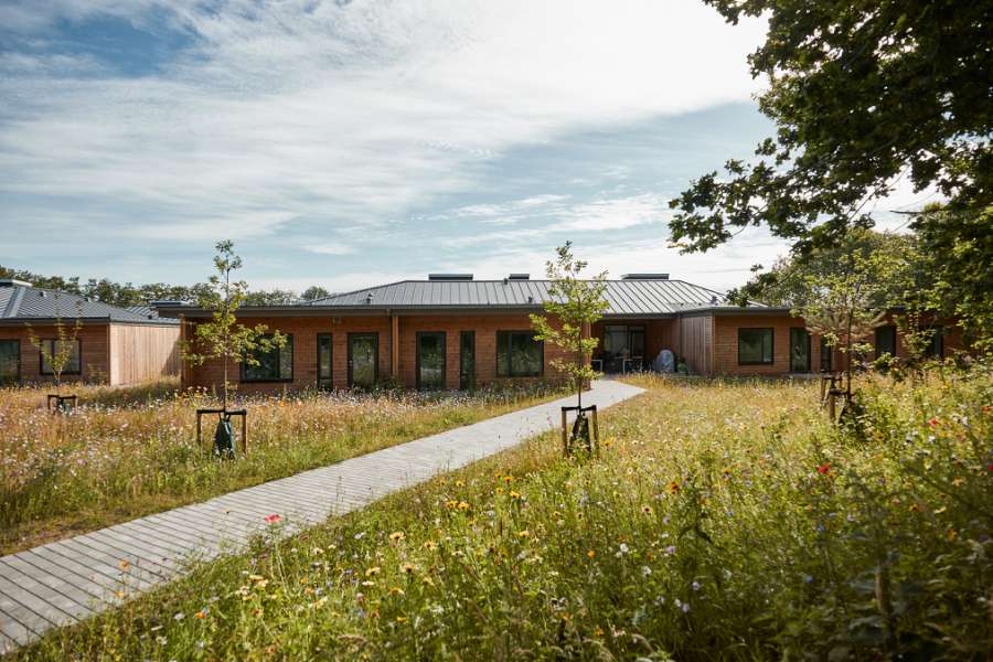 Homes and facilities for autistic residents, clad in wood and steel profiles, and surrounded by forest, AutismeCenter Skive, Jægervej 16, 7800 Skive